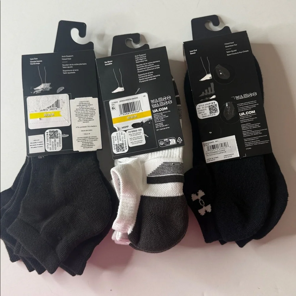 Under Armour Assortment of Socks 8 Pairs Size Medium. Black and White.